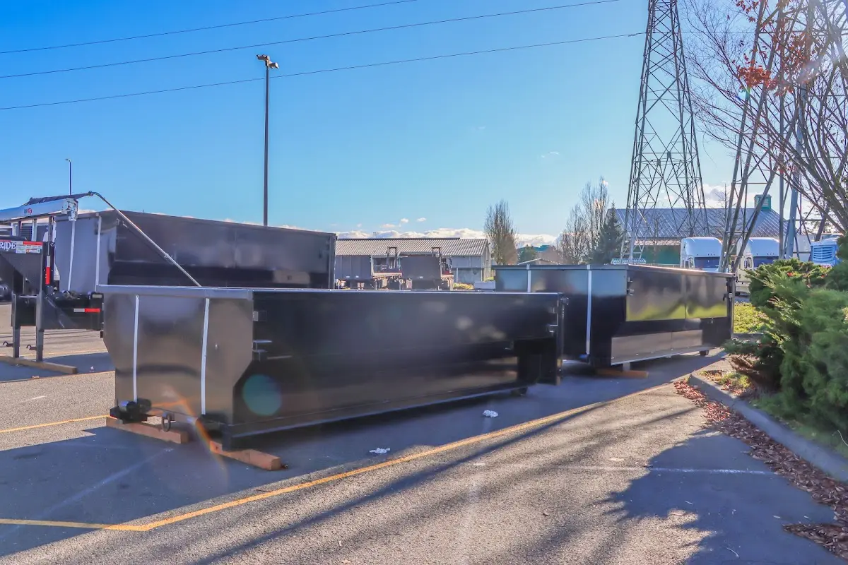 Roll-off dumpster ready for waste disposal at job site for Concrete Dumpster Rental in Fredericksburg